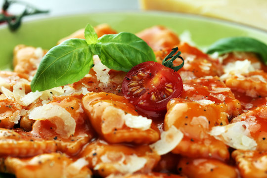 Ravioli with tomato sauce and basil