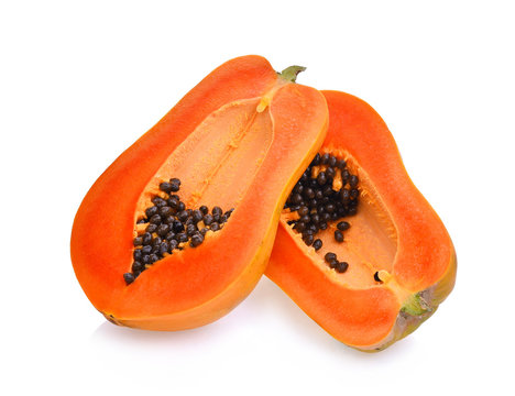 half of fresh papaya isolated on white background