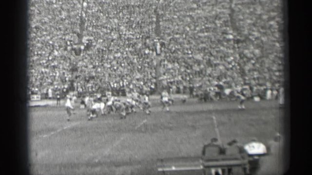 1944: rugby match going in a stadium where lot of people's witnessing it SAN FRANCISCO CALIFORNIA