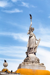 Birds land on statue at the Parque Del Centenario in Cartagena, Colombia.
