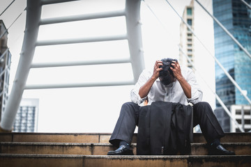 Bankruptcy or Depressed Businessman Walking Stairs way outdoor, Tired businessman Walking modern sky walk background