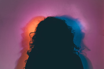 colorful abstract silhouette portrait of mystery woman
