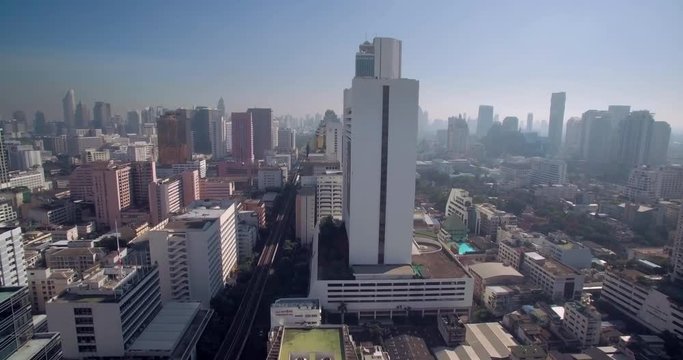 Clean Blue Sky and Cityscape Of Downtown Bangkok, Thailand, Slider Shot
