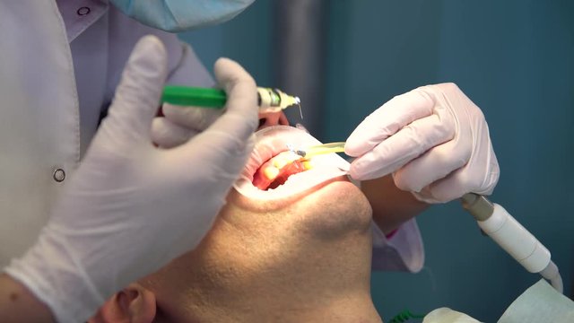A young man came to the dentist for dental treatment