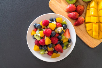 mixed fresh fruits (strawberry, raspberry, blueberry, kiwi, mango)