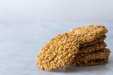 Middle Eastern Sesame Cookies in a Stack on Light Background Copy Space Horizontal