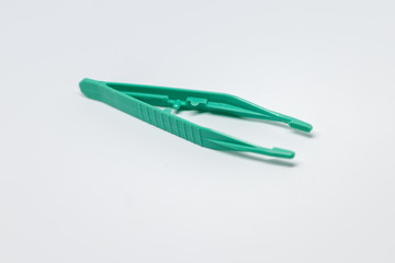 Green pliers for first aid on white background, Isolate Pliers 