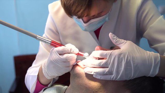 A young man came to the dentist for dental treatment