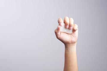 Hand holding soap bar