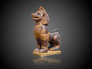Asian Imperial Lion Statue isolate on gradient Black and white background