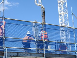 Fototapeta premium Construction workers talking