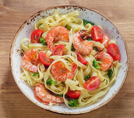 Pasta with shrimps and vegetables. Healthy eating concept.