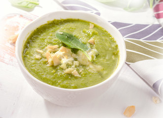 Bowl of green vegetables soup.