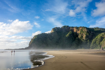 Karekare. Strong wind, cold water.