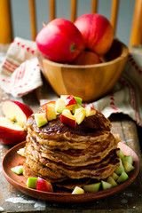Apples pancakes with marple syrup