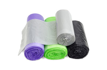 Plastic garbage bags in rolls of different sizes and colors