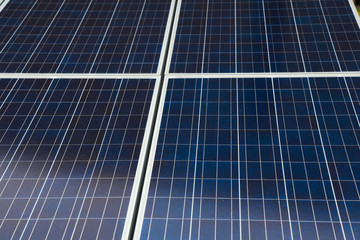 Closeup of blue photovoltaic solar panels