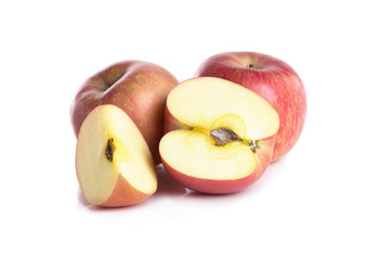 Apple and a half close-up view isolated on white background.