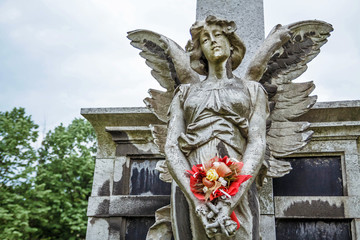 Fragment statue of angel at the Kerepesi cemetery in Budapest.