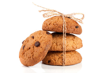 Oatmeal cookies with chocolate tied rope isolated on white background