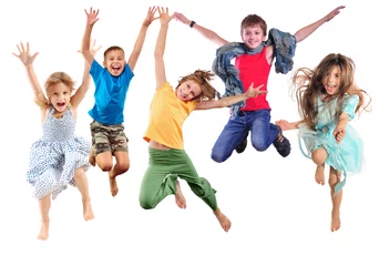 Fototapeten group of happy cheerful sportive children jumping and dancing © Cherry-Merry