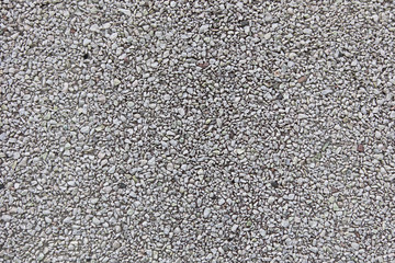 Concrete wall with small rocks