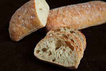 Fresh sliced italian Ciabatta bread on background