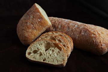 Fresh sliced italian Ciabatta bread on background