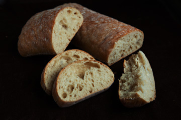 Fresh sliced italian Ciabatta bread on background