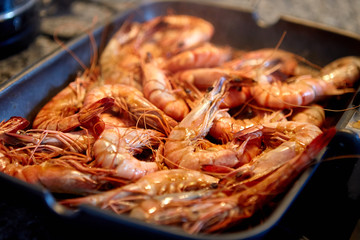 Cooking tiger prawns grilled. Close-up. Background.