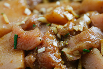raw chicken with vegetables and spices top view close up