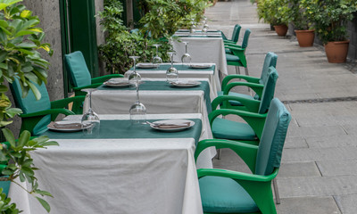  restaurant / Tables and chairs in front of a restaurant 