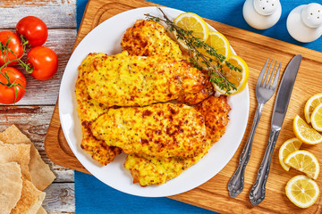 Baked Chicken breast coated with melted cheese