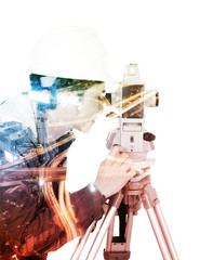 Double exposure of engineer working with survey equipment theodolite on a tripod against the city...
