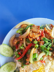 Close-up,Thai food:fried kale with crispy pork egg