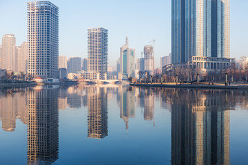 Obraz premium River And Modern Buildings Against Sky in Tianjin,China.
