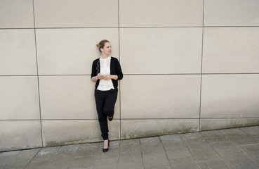 Fototapeta na wymiar Businesswoman with digital tablet