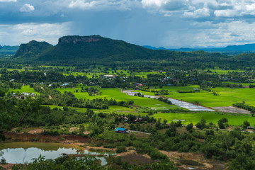 Thailand landscape of rural city and mountain under the cloudy sky