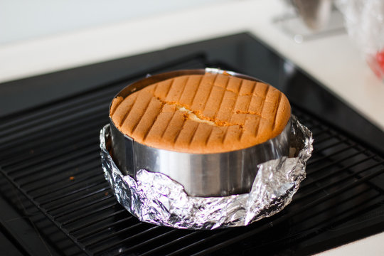 Vanilla Cake Baking In The Pan Hot Out Of The Oven.