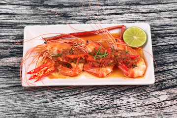 Large prawn topped spicy coconut cream curry.
