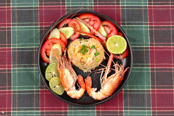 Fried Jasmine rice with large prawns in heart shape.