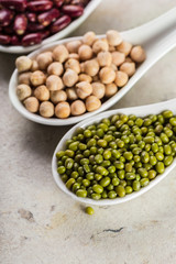 mix of beans on wooden table