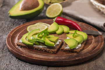 Avocado sandwich on dark rye bread