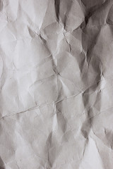 Crumpled and crushed white paper texture background