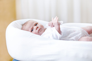 Fototapeta na wymiar Portrait of cute adorable newborn baby child