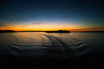 A beautiful, colorful seascape of the Sweden winter eventing from a ferry