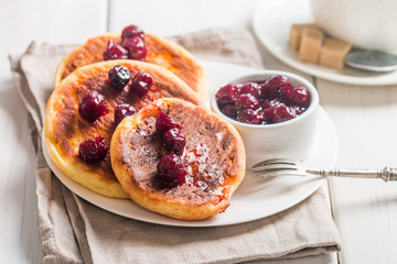 Cottage cheese pancakes with cherry sauce