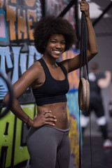 Obraz na płótnie Canvas portrait of black women after workout dipping exercise