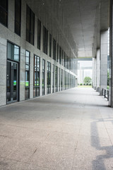 empty footpath and modern building in modern city