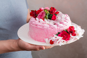 Pink cake with natural beautiful flowers